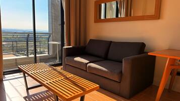 Deluxe Room, Balcony, City View | Desk, laptop workspace, iron/ironing board, free WiFi