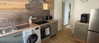 Cozy 2-room apartment with large roof terrace