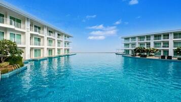 Condo, 1 Bedroom, Accessible, Balcony | Pool | Outdoor pool