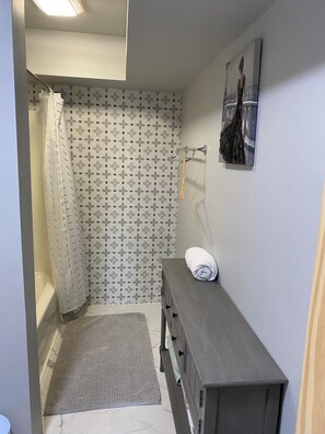 Hair dryer, towels, soap, toilet paper