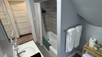 Hair dryer, towels, soap, toilet paper