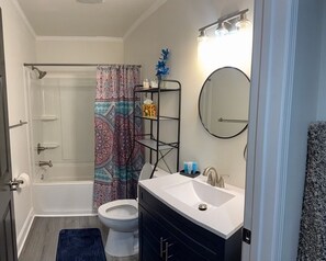 Shower, hair dryer, towels, soap
