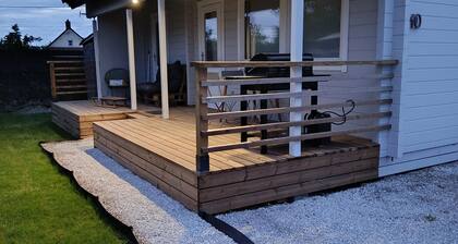 Chalet near the beach in a private wooded estate with fishing pond