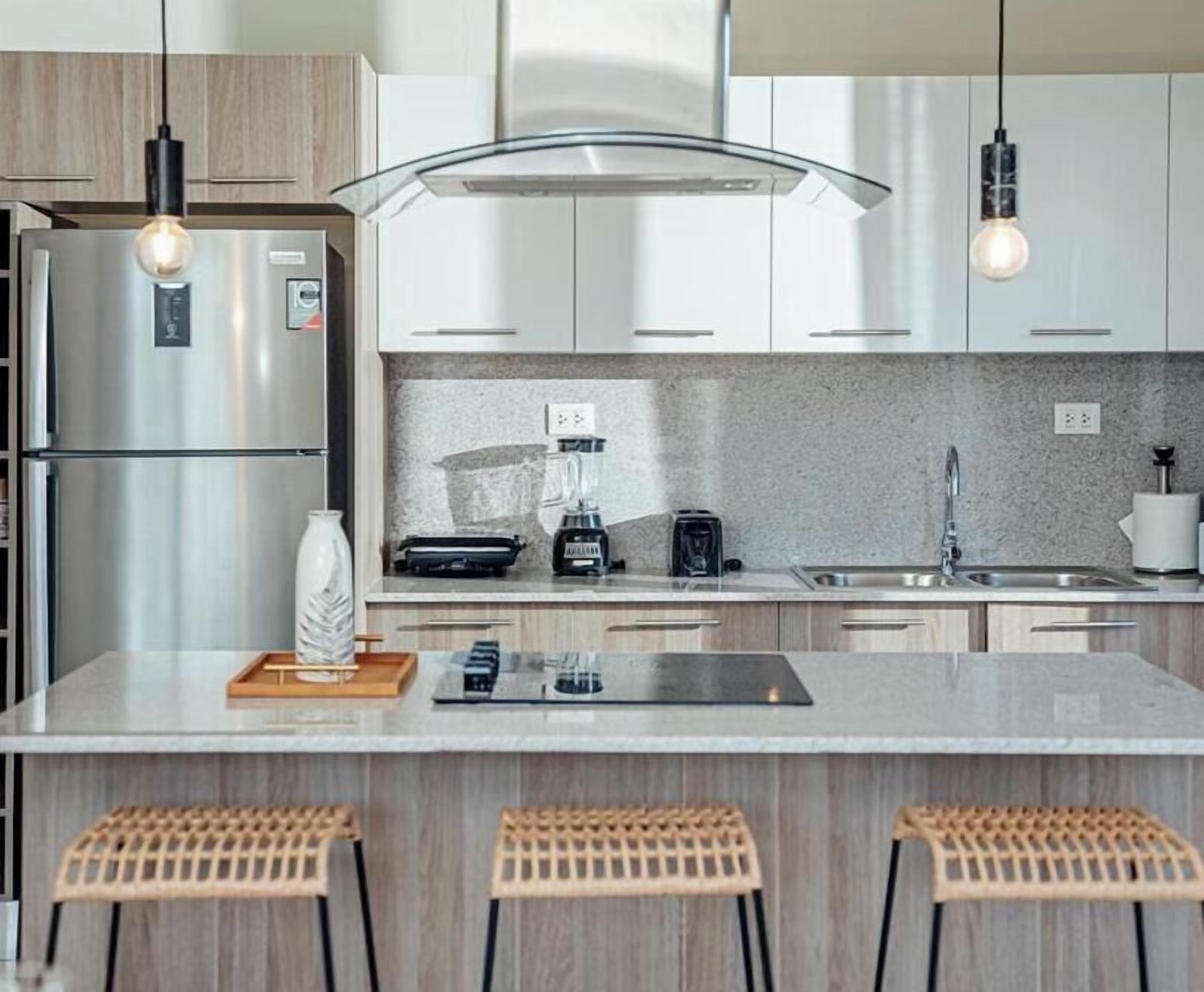 Coffee/tea maker, fridge, microwave, oven