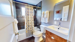 Condo | Bathroom | Combined shower/bathtub, hair dryer, towels, soap