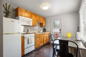 Condo | Private kitchen | Full-size fridge, microwave, oven, stovetop
