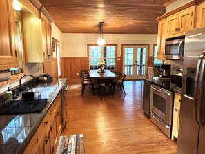 Fridge, microwave, oven, stovetop - Lakefront, Stone Fireplace, Game Room & Fire Pit Overlooking Lake. Sleeps 10. (Woodland)