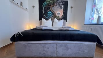 1 habitación, tabla de planchar con plancha, cuna de viaje y wifi
