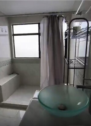 Shower, towels, soap, toilet paper