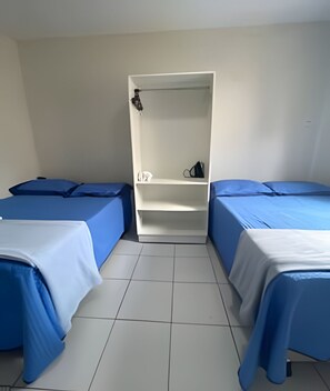 2 عدّة غرف نوم ومكواة/لوح كي وخدمة الإنترنت وملاءات أسرّة