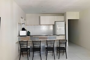 Fridge, microwave, oven, cookware/dishes/utensils