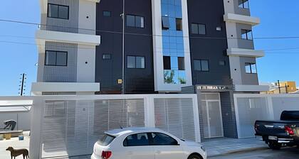 03 bedrooms (air conditioning and fan), up to 10 people, garage, behind the Unimed hospital