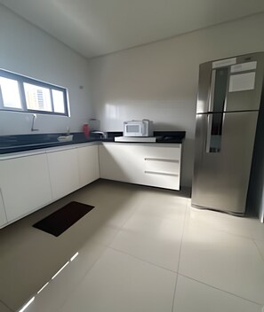 Fridge, microwave, cookware/dishes/utensils