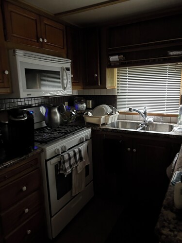 Cozy park! Pool and clubhouse easily accessible. Golf cart to get around.