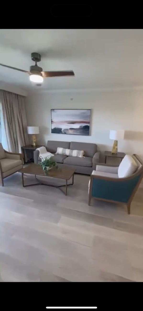 Single Room, 1 Bedroom, Private Bathroom, Resort View | Living area | 50-inch TV with cable channels