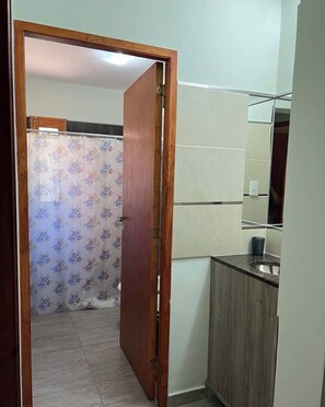 Shower, towels, soap, toilet paper