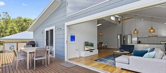 Blue Sky Beach House backyard to beach in moments