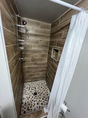 Shower, towels, toilet paper