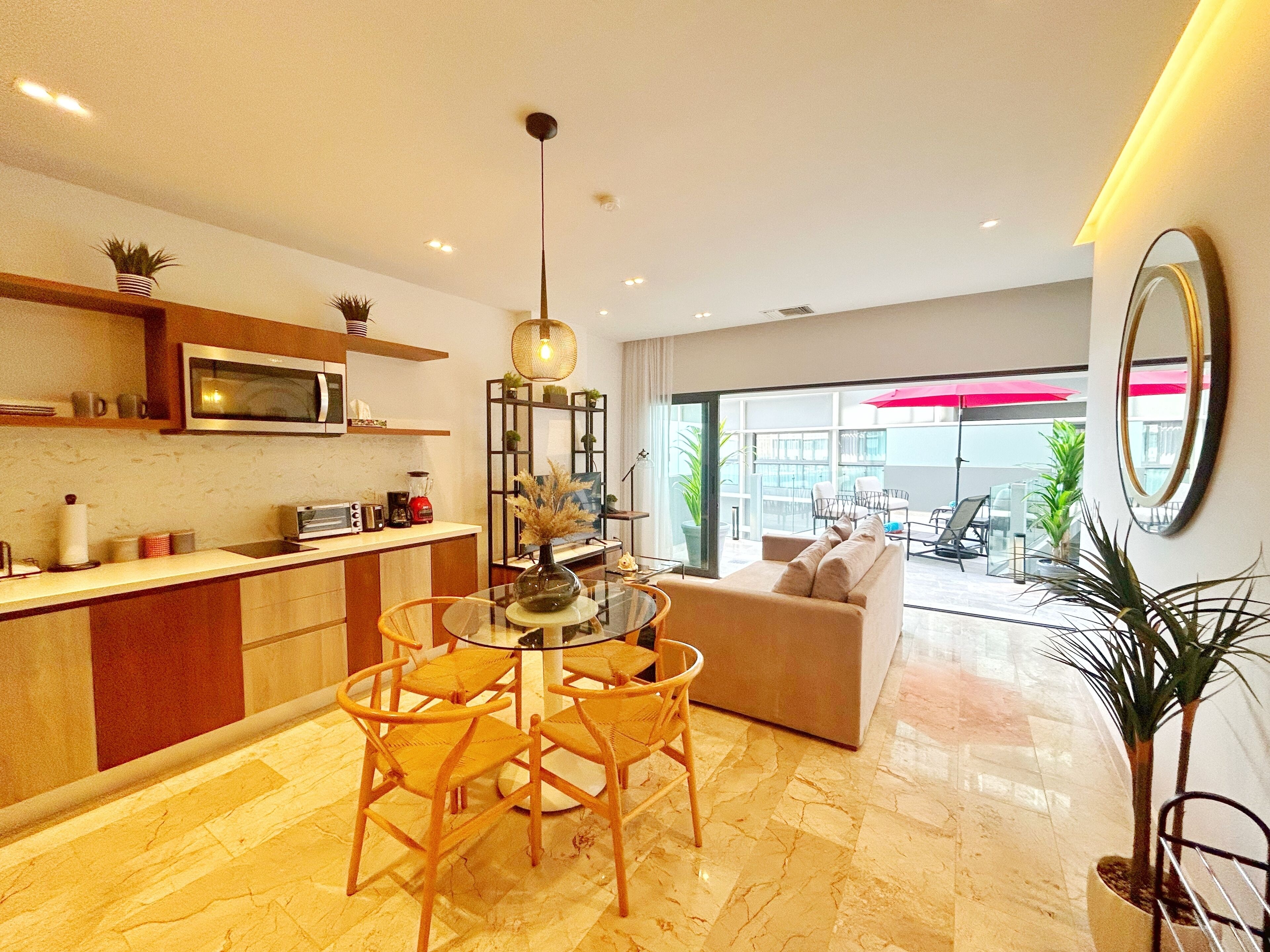 Departamento Confort, 1 habitación | Área de sala de estar | Televisión de pantalla plana 