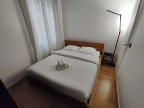1 bedroom, desk, iron/ironing board, travel cot