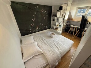 Desk, iron/ironing board, travel cot, free WiFi