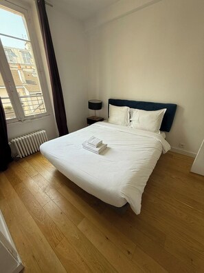 1 bedroom, desk, iron/ironing board, travel cot