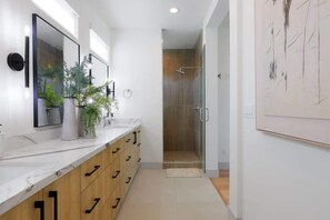 Shower, hair dryer, towels, shampoo