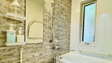 Hair dryer, towels, soap, toilet paper
