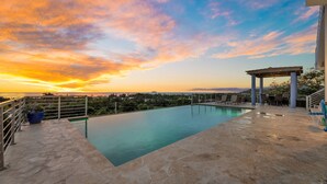 A rooftop pool with a view of the sunset, outdoor seating, and a pergola. - Casa De La Bandera//Private villa, amazing views! (Rincon)