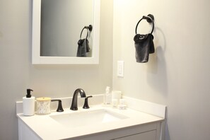Hair dryer, towels, soap, toilet paper