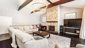 Smart TV, fireplace, books