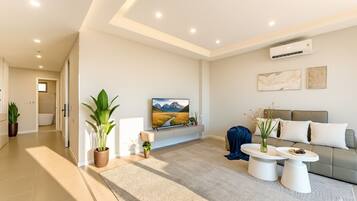 Apartament prèmium | Sala d'estar | Televisor