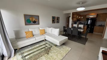 Family Apartment, Mountain View | Living area | 50-inch Smart TV with digital channels