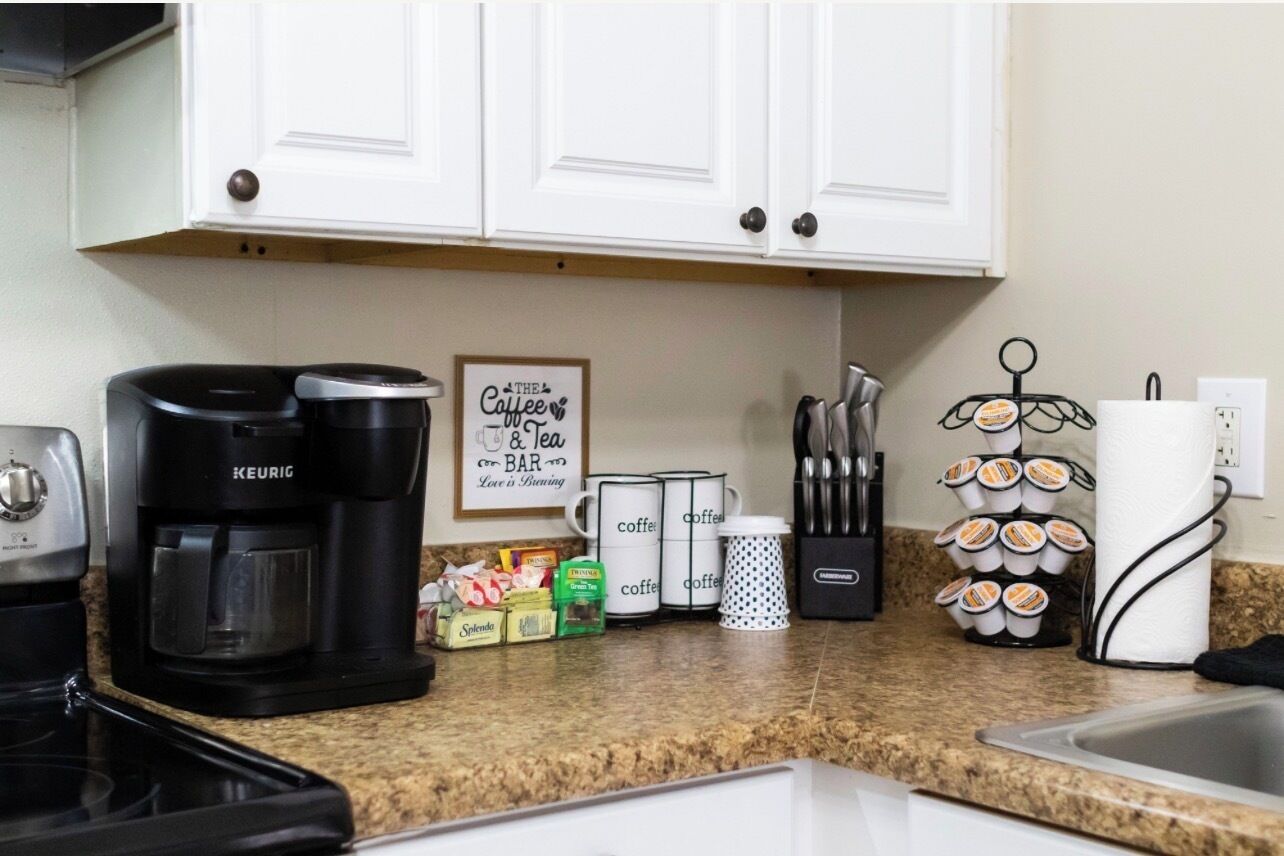 Coffee/tea maker, fridge, microwave, oven