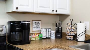 Coffee/tea maker, fridge, microwave, oven