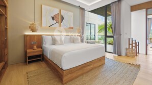 A modern bedroom with a large bed, wooden headboard, bedside tables, and a view of the outdoors through a sliding glass door. - Dago Escape Villa by Kozystay - Bandung (Cimenyan)