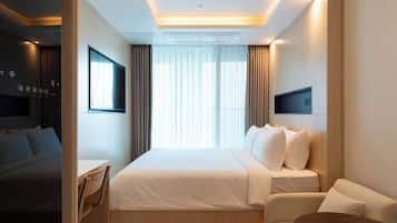 Desk, laptop workspace, free WiFi, bed sheets