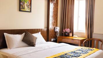 Deluxe Room, City View | Laptop workspace, free WiFi
