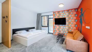 Deluxe Suite, Patio, Park View | In-room safe, blackout drapes, soundproofing, iron/ironing board