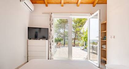 Holiday home in a small village - sourrounded by olives and nature