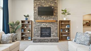 Smart TV, lareira, videogames, mesa de pingue-pongue