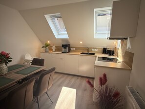 Kylskåp, ugn, spishäll och diskmaskin