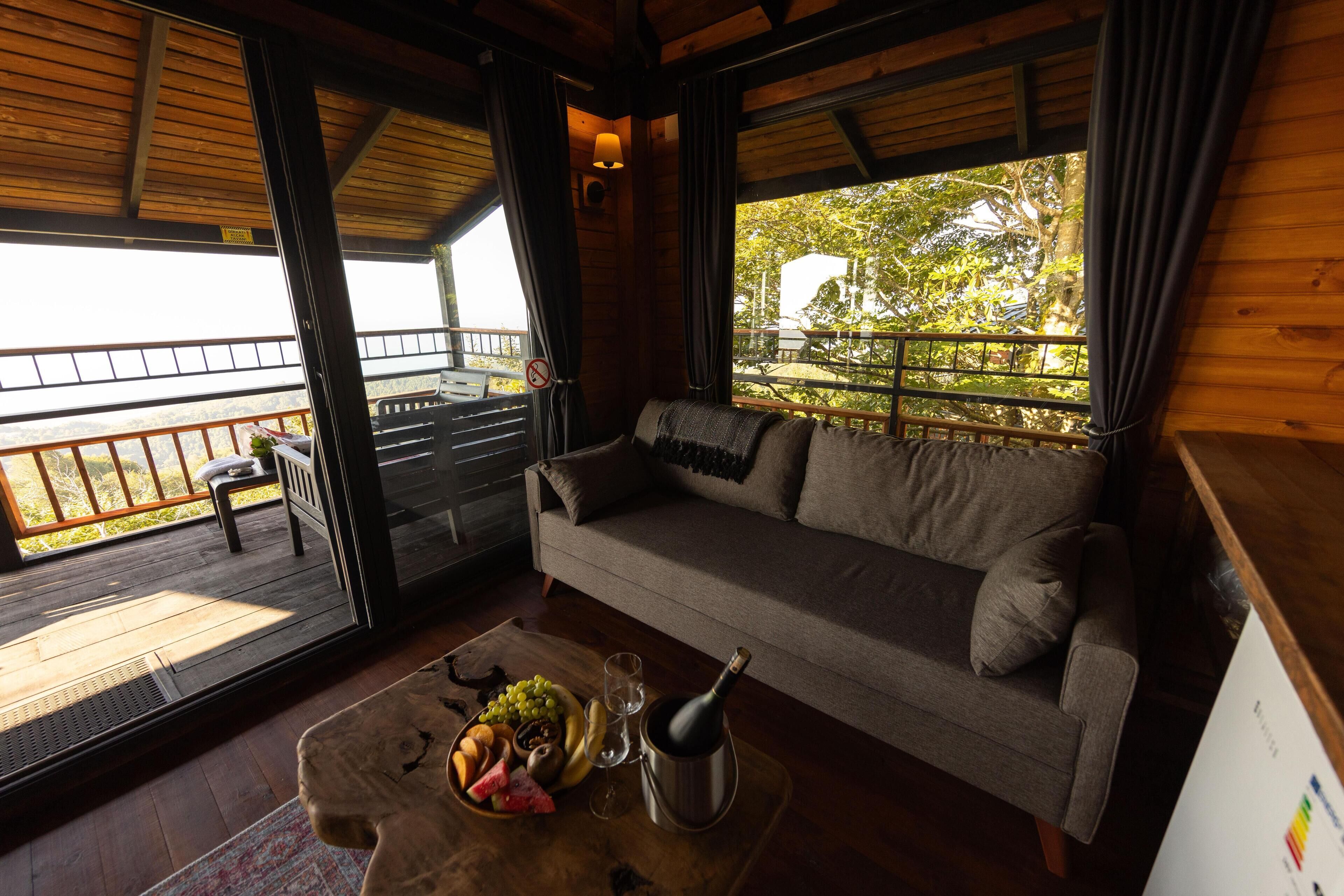 Chambre Deluxe, vue mer | Espace de travail pour ordinateur portable, rideaux occultants