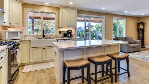 A spacious kitchen with a large island, built-in appliances, and a view to the outdoors. - Private Outdoor Space 9 Mi to Downtown Vancouver! (Vancouver)