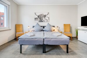 2 habitaciones, tabla de planchar con plancha, wifi y ropa de cama