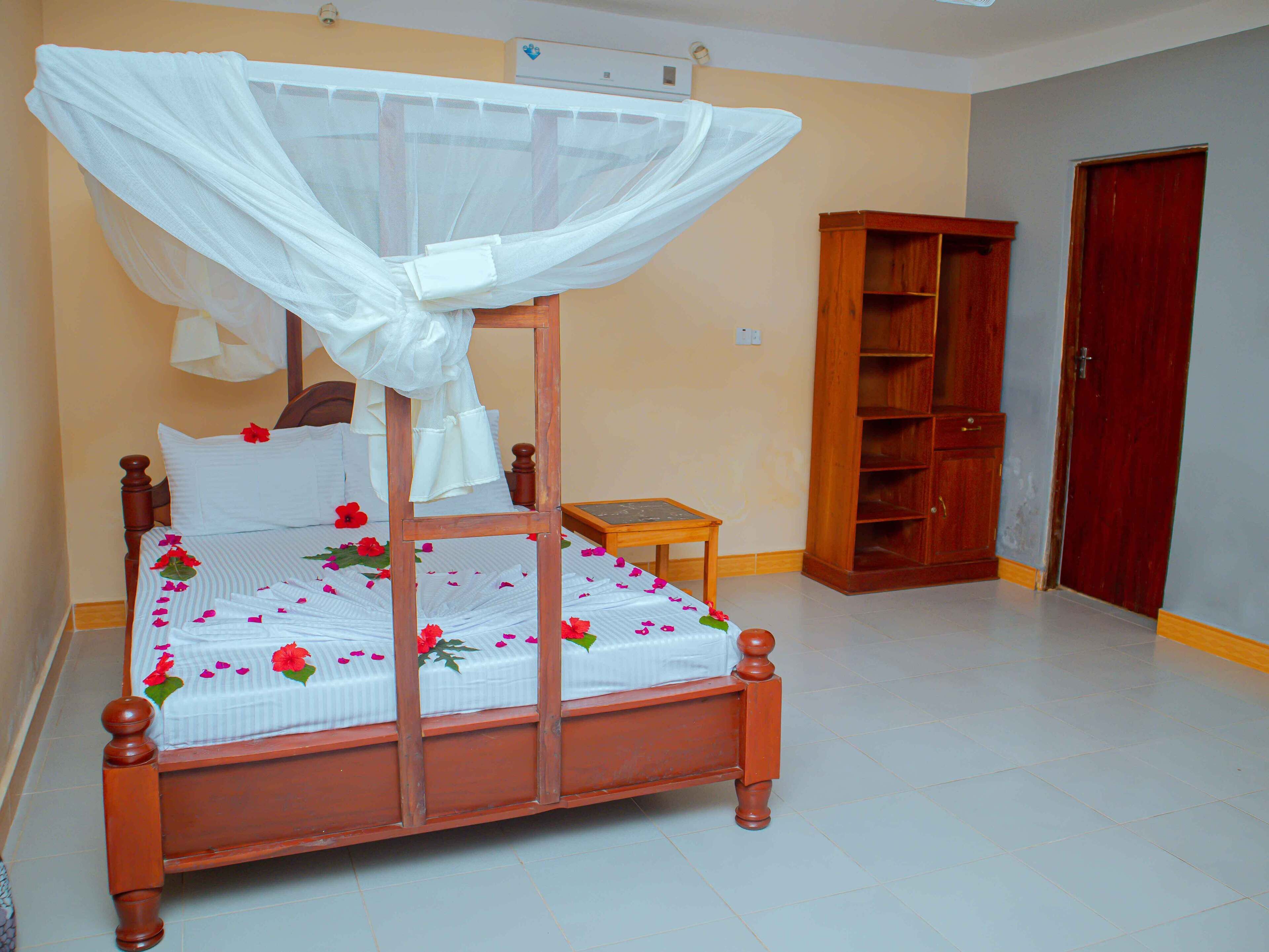 Standard Double Room, Balcony, Garden View | Iron/ironing board, free WiFi
