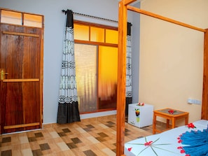 Standard Double Room, Balcony, Garden View | Iron/ironing board, free WiFi