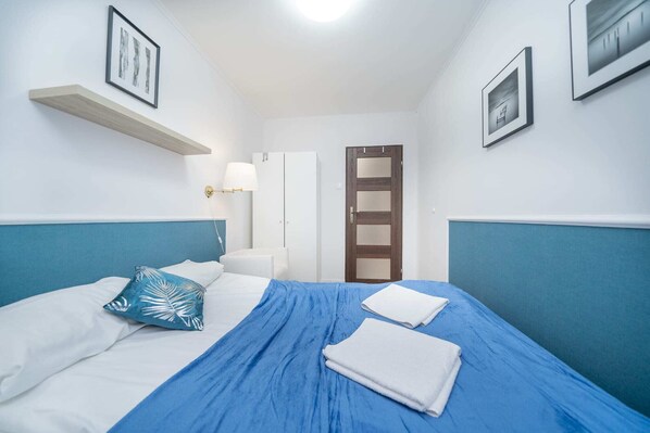 1 bedroom, desk, iron/ironing board, travel crib