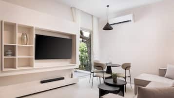 Glyfada Prime Apartment | Living area | 50-inch Smart TV with satellite channels, Netflix, streaming services