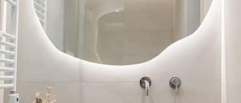 Glyfada Prime Living | Bathroom | Shower, rainfall showerhead, free toiletries, hair dryer